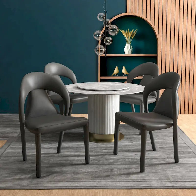 Sedia da pranzo moderna rivestita in ecopelle con struttura e gambe in acciaio