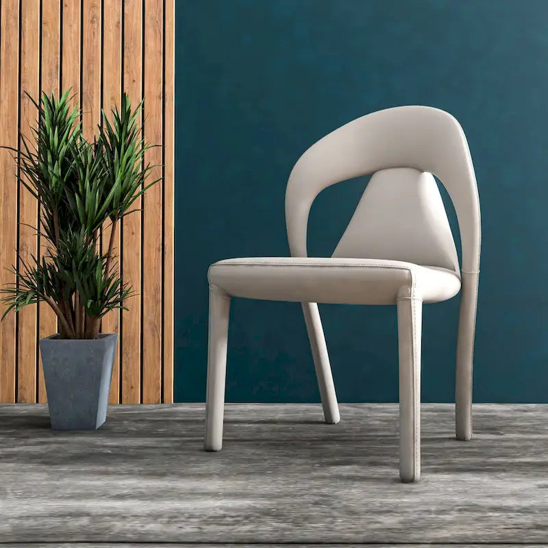 Sedia da pranzo moderna rivestita in ecopelle con struttura e gambe in acciaio