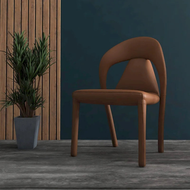 Sedia da pranzo moderna rivestita in ecopelle con struttura e gambe in acciaio